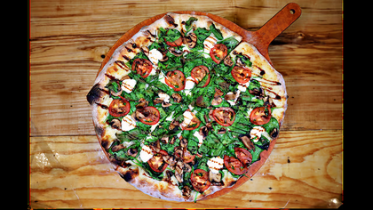 West by God CoalFired Pizza + Axe Throwing